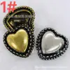 Botón metálico de alta gama botón con forma de corazón botón de corazón de melocotón botón estilo Chanel retro elegante hebilla decorativa