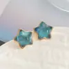 Brincos originais feitos à mão de Pedra da Lua azul com cinco estrelas pino s925 ins para meninas brincos fofos design nicho clipe de orelha