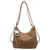 Bolsa de mano casual retro de gran capacidad para mujer, nuevo modelo otoño 2026, bolso de hombro para ir al trabajo, bolsa de cuero suave, mochila moderna