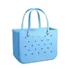 Bolsa de mano perforada de EVA, estilo nuevo, diseño simple hueco, impermeable, para actividades al aire libre, compras y llevar comestibles