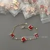 Marca de Luxo High-End Pulseira de Trevo de Quatro Folhas Redondo em Forma de Diamante, Flor de Quatro Pétalas, Flor de Cinco Pétalas para Mulheres, Madrepérola Branca, Madrepérola Rosa, Modelo Popular, Vendas Diretas por Transmissão ao Vivo