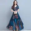 Vestido Longo de Verão 2021 Feminino com Decote em V e Saia Ampla Estampado Coreano Elegante para Mulheres de Meia-idade