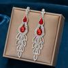 Pendientes de diamantes de imitación transfronterizos de Europa y Estados Unidos personalizados con forma de gota, accesorios de vestir para trajes de novia de moda