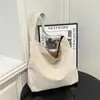 Coleção de outono 2026 transfronteiriça: bolsa de mão retrô versátil, bolsa de ombro de grande capacidade, bolsa tote estilosa para o trajeto