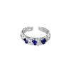 Anillo de personalidad abierta de zafiro con diseño de lujo ligero moderno estilo ins coreano, nicho de alta gama, textura de lava, goteo de pegamento para mujer