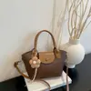 Bolsa Transversal Feminina Versão Coreana 2026 Nova Moda Bolsa de Ombro para Mulheres Versátil Bolsa de Mão para o Dia a Dia Atacado