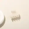 Nuevo pasador de garra pequeño de cuatro puntas de PC de color caramelo dulce transfronterizo para mujer, pinza de tiburón simple para peinado semi-recogido, accesorio para el cabello