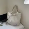 Bolso de hombro casual simple estilo japonés inspirado en Ins para mujer, nuevo modelo 2026, bolso tote de gran capacidad, color liso para estudiantes