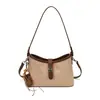 Bolsa de Axila Vintage Fosca para Mulheres 2026 Nova Moda Outono Nicho Luxo Leve Diária Ombro Transversal Tendência Bolsa