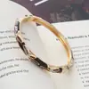 Nuevo brazalete estilo chino de esmalte con goteo de aceite para mujer, pulsera versátil pintada artísticamente vintage, superventas transfronterizo, joyería de moda de lujo ligero