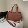 Bolsa de lona de grande capacidade para mulheres, nova coleção de verão 2025, bolsa transversal de ombro única de nicho, bolsa tote plissada estilo coreano para escola