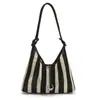 Elegante bolsa de balde grande com vazados, bolsa de ombro para mulheres, nova moda 2026, bolsa de palha versátil para o dia a dia