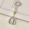 Llavero de bolso con incrustaciones de diamantes de arcilla transfronterizo, lleno de diamantes, accesorio de llavero de coche deslumbrante de alta gama