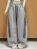 Calça casual listrada esportiva simples para mulheres, design de outono 2026, cintura alta, modelagem que afina, solta, calça pantalona versátil