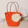 Venta al por mayor de fábrica 5 colores versión coreana de bolsa de paja con flores bolsa portátil para mujer bolsa de paja pequeña fresca bolsa tejida bolsa de playa para vacaciones