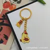 Llavero Colgante Año Nuevo 2026 Metal Zodiaco León Dorado Petardo Despertar Bolsa de la Fortuna Colgante Evento Pequeño Regalo
