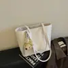 Bolso tote para mujer, moda coreana, gran capacidad, bolso casual de axila, patrón tejido 2026, bolso de hombro de nicho de moda para mujer