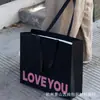 Bolsa de Papel Tipo Satchel para Tienda de Ropa de Alta Gama Bolsa Satchel Negra sin Pliegues Bolsa de Papel con Logo Personalizado Bolsa Satchel Universal para Centro Comercial