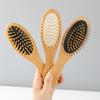 En stock, peine de bambú con mini cojín de aire, portátil, de acero, con aguja, para el hogar, con dientes redondos, peine de mano a mano.