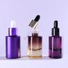 Frasco gotero nuevo personalizado de 15 ml Vidrio engrosado Frasco de aceite esencial Frasco de esencia de color degradado Frasco recargable Frasco cosmético