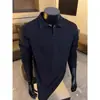 Novas camisas polo 2026 para homens e mulheres, estilo casual simples de alta qualidade, elegante e moderno, camisa versátil de manga comprida com colarinho