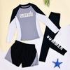 Traje de baño nuevo 2025 dividido mediano y grande para niños con protección solar, traje de baño de buceo para niños, traje de baño de manga larga agradable para la piel, transpirable, tres piezas