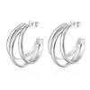 Aretes transfronterizos de Amazon con material de acero inoxidable, aretes personalizados de moda, aretes de baratija de Joker, arco C