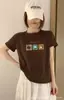 Vendas diretas das bancas da Rua Treze: Camiseta feminina canelada de algodão com mangas dobradas, top justo de manga curta, estilo verão, disponível para dropshipping