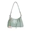 Bolsa Casual Simples Bolsa Bolinho para Mulheres 2026 Primavera Novo Estilo Nicho Elegante Textura de Alta Qualidade Bolsa de Ombro Transversal