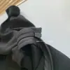 Falda de temperamento superadelgazante cola de pez elegante entallada a la cintura corte al bies cuello redondo manga corta acetato pequeño vestido negro 11805