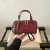 Bolso Boston Estampado Leopardo Retro para Mujer Marrón Oscuro Patchwork Bolso de Hombro Único Cruzado 2026 Nuevo Estilo Bolso con Colgante de Flor Tridimensional Moda