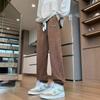 Pantalones casuales para hombre, pantalones con bolsillos decorados, monos holgados, modernos, microelásticos, de cintura alta, moda juvenil, marca de moda.