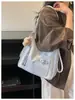 Bolsa Tote Simples Casual de Ombro Grande Capacidade Feminina Verão 2026 Nova Alta Aparência Mochila Transversal para o Dia a Dia