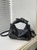 Bolsa de Mão Pequena Tendência Estilo Coreano Atacado Transfronteiriço para Mulheres 2026 Nova Moda Bolsa Meia-Lua com Laço Bolsa de Ombro Único Transversal