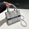 Bolso de mano de gran capacidad 2025 primavera nuevo versátil ins popular de este año bolso bandolera de hombro moderno bolso tote