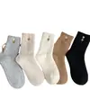 Calcetines de rizo para mujer para otoño e invierno, forrados de felpa y engrosados, lindos calcetines holgados de media pantorrilla, calcetines cálidos para maternidad con bordado de corazón