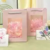 Bolsa con ventana en stock Bolso con ventana transparente Regalo creativo Bolsa de papel con ventana Bolsa de embalaje de ramo de flores Portátil