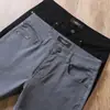 Jeans Gris Azul de Alta Gama Europeos y Americanos para Hombre Verano Delgados de Tiro Medio Elásticos Lavados de Negocios Versátiles Casuales Modernos