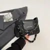 Bolsas de nicho populares de vários anos para mulheres, outono de 2026, novo estilo, bolsa transversal texturizada, bolsa de mão, bolsa de ombro única, bolsa de axila