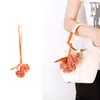 Colgante de cuero de cereza con borla estilo francés, un regalo portátil para viajes, llavero de coche, accesorio para bolso de teléfono, disponible para venta al por mayor