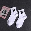 Calcetines de otoño e invierno para mujer hasta media pantorrilla blanco y negro estilo campus NY calcetines para pareja barras paralelas letras running hip hop media pantorrilla Deportes calcetines para hombre