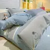 Colección nueva 2026: Juego de ropa de cama de cuatro piezas, 100% algodón, engrosado, cepillado y estampado, que incluye una funda de edredón, una sábana plana y una sábana ajustable
