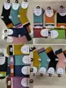 Calcetines de algodón gruesos de punto para bebé, otoño e invierno, altos, holgados, a rayas, con letras de dibujos animados, calcetines para niños, venta al por mayor, envío completo