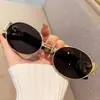 2026 Nuevas Gafas de Sol Metálicas con Montura Pequeña Ovalada para Belleza de Cabeza Unisex Tendencia Genial Estilo Europeo y Americano Gafas de Sol de Celebridad de Internet