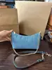 Coach C 2026 Nuevo Estilo Caitlin 24 Bolso de Hombro con Cadena de Cuero Genuino Bolso de Axila Bolso Dumpling Bolso de Mano para Mujer Bolso Cruzado