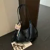 Bolso de Hombro Casual Transfronterizo para Mujer Otoño/Invierno 2026 Nuevo Estilo Moda para Viajes Cotidianos Bolso de Axila Gran Capacidad Bolso Bandolera de un Solo Hombro