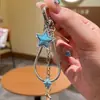 Moda estilo coreano estilo ins cadena de hueso de serpiente estrella correa para teléfono llavero colgante para bolso de cámara CCD para niñas