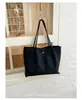 2026 Nueva Bolsa de Mano de Nylon para Mujer de Gran Capacidad para el Trabajo Bolso de Hombro Único Bolso de Mano Versátil Retro Bolso Sencillo de Albóndiga