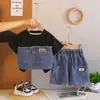 Ropa Nueva de Verano para Niños 2026: Elegante Conjunto de Camisetas para Niños, Conjunto de Dos Piezas de Mezclilla con Parches de Verano, Cuello Redondo, para Exportación