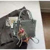 Bolsa Pequena Elegante de Alta Qualidade para Mulheres 2026 Nova Coleção Primavera/Verão Cor Sólida Versátil Bolsa Transversal Fashionable Bolsa de Mão Bolsa Saco